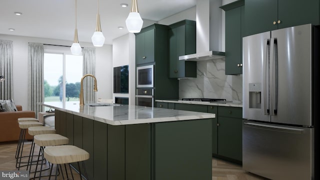 42125 Picasso Sq, Ashburn, VA 20148 - kitchen featuring stainless steel appliances, wall chimney range hood, green cabinets, and recessed lighting
