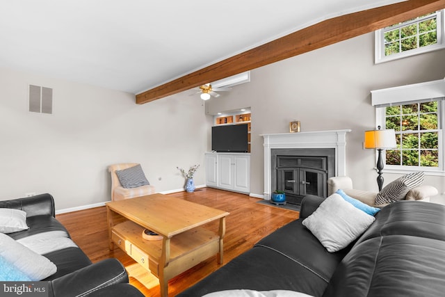 3773 Plum Hill Ct, Ellicott City, MD 21042 - living area featuring ceiling fan, a fireplace with flush hearth, wood finished floors, and beam ceiling
