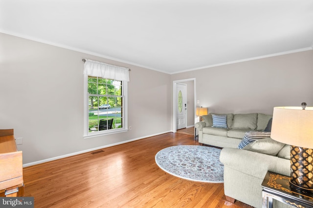 3773 Plum Hill Ct, Ellicott City, MD 21042 - living area featuring ornamental molding and wood finished floors