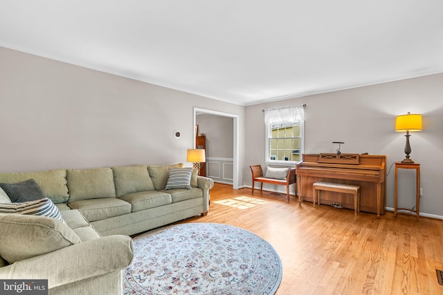 3773 Plum Hill Ct, Ellicott City, MD 21042 - living room with ornamental molding and light wood finished floors
