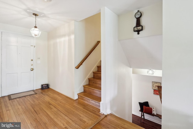 1606 Peacock Ln, Silver Spring, MD 20904 - foyer entrance with light wood-style flooring and stairs