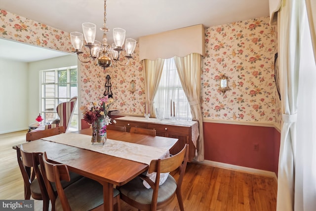 1606 Peacock Ln, Silver Spring, MD 20904 - dining space featuring wallpapered walls, a chandelier, and light wood-type flooring