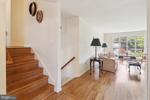 1606 Peacock Ln, Silver Spring, MD 20904 - staircase featuring wood finished floors and baseboards