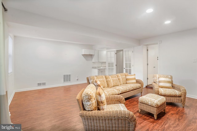 1606 Peacock Ln, Silver Spring, MD 20904 - living area with wood finished floors, recessed lighting, and bar area