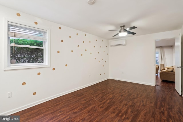 1606 Peacock Ln, Silver Spring, MD 20904 - empty room with an AC wall unit, wood finished floors, a ceiling fan, and a smoke detector