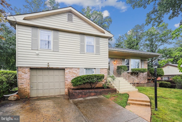 1606 Peacock Ln, Silver Spring, MD 20904 - split level home featuring a garage, brick siding, concrete driveway, and a front lawn