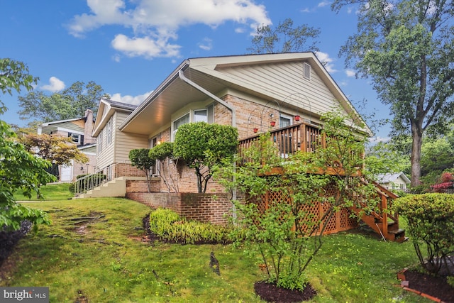 1606 Peacock Ln, Silver Spring, MD 20904 - view of side of property with stairway, brick siding, and a lawn