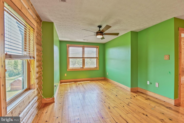1903 Buck Mountain Rd, Bentonville, VA 22610 - unfurnished room featuring a textured ceiling, ceiling fan, and hardwood / wood-style floors