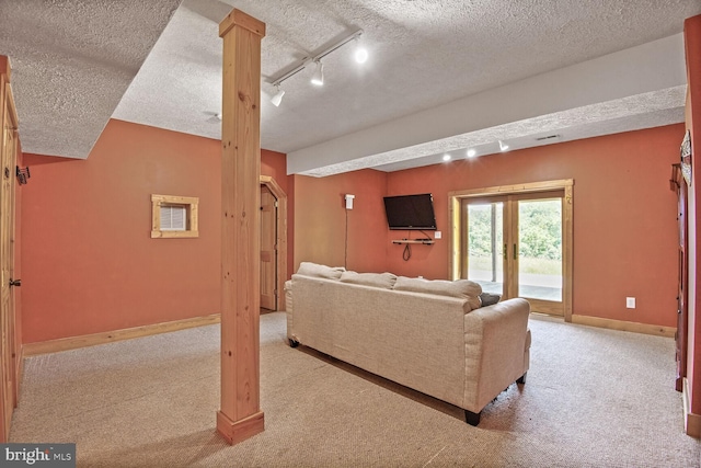 1903 Buck Mountain Rd, Bentonville, VA 22610 - living area with carpet flooring, rail lighting, french doors, and a textured ceiling