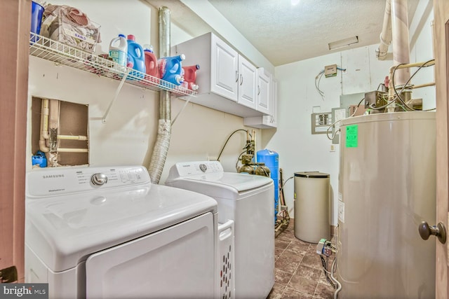 1903 Buck Mountain Rd, Bentonville, VA 22610 - laundry area with water heater, separate washer and dryer, a textured ceiling, and cabinet space