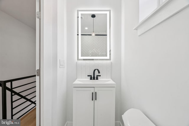1835 Dudley St, Philadelphia, PA 19145 - half bathroom featuring vanity and toilet