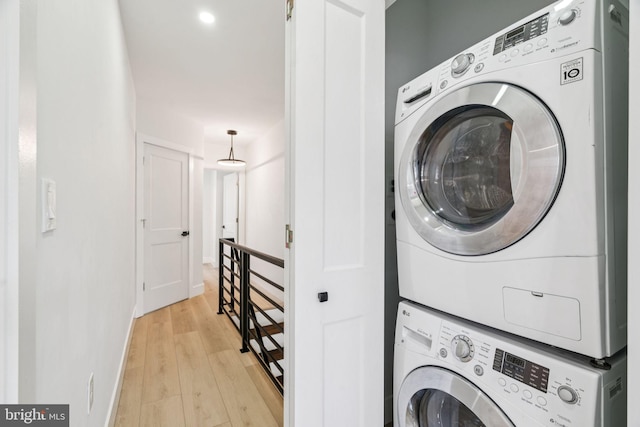 1835 Dudley St, Philadelphia, PA 19145 - laundry room featuring estacked washer and dryer and light wood-style floors