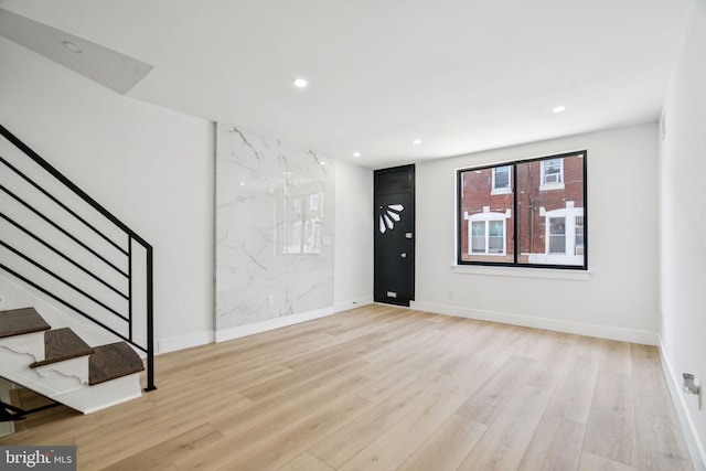 1835 Dudley St, Philadelphia, PA 19145 - unfurnished living room featuring stairs, wood finished floors, and recessed lighting