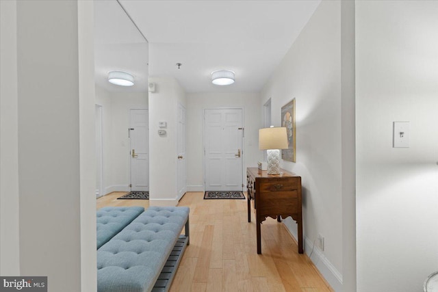 8101 Connecticut Ave Unit N-102, Chevy Chase, MD 20815 - entrance foyer featuring light wood-style floors and baseboards
