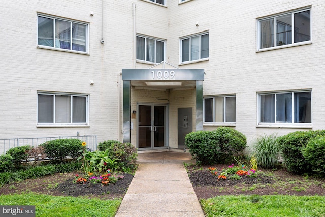 1009 Chillum Rd Unit 305, Hyattsville, MD 20782 - view of exterior entry with brick siding