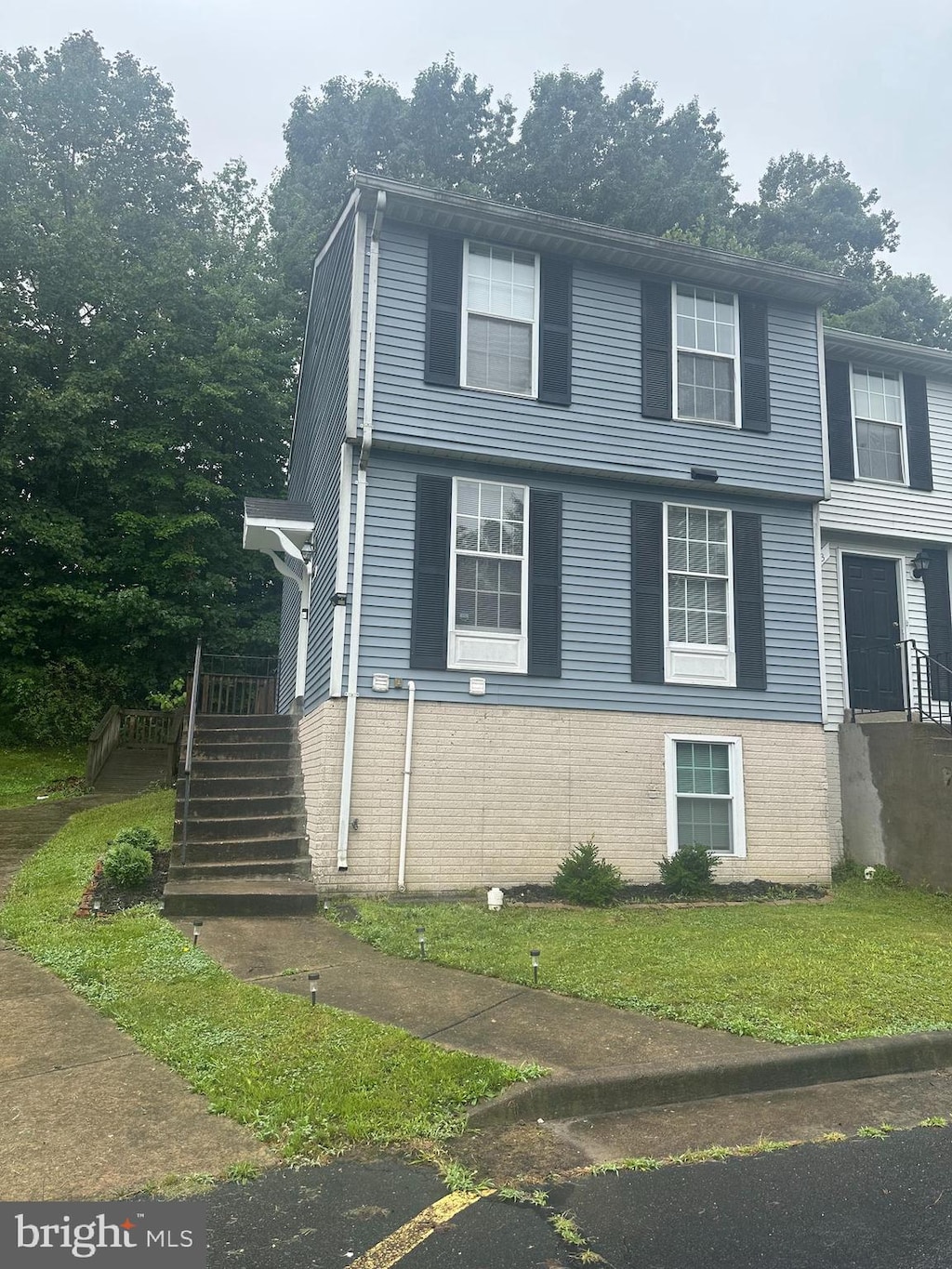 401 Carnaby St Unit 1, Stafford, VA 22554 - view of front of house with a front lawn