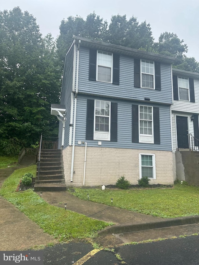 401 Carnaby St Unit 1, Stafford, VA 22554 - view of front of house with a front lawn
