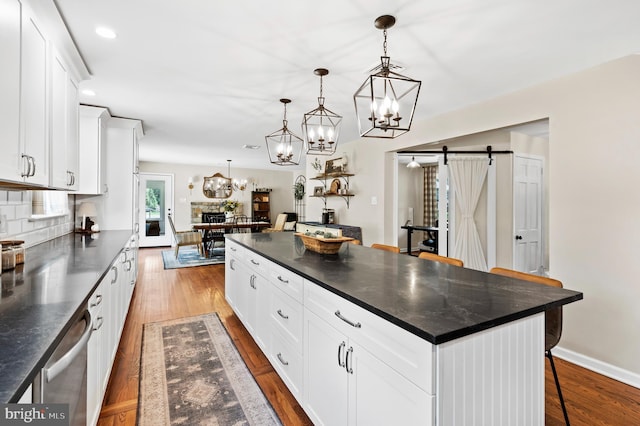 126 Woodview Dr, Doylestown, PA 18901 - kitchen featuring a chandelier, dark countertops, backsplash, dishwasher, and recessed lighting