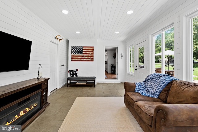 126 Woodview Dr, Doylestown, PA 18901 - tiled living area with recessed lighting, wood ceiling, and wood walls