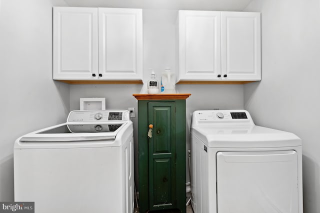 126 Woodview Dr, Doylestown, PA 18901 - washroom featuring cabinet space and washer and dryer