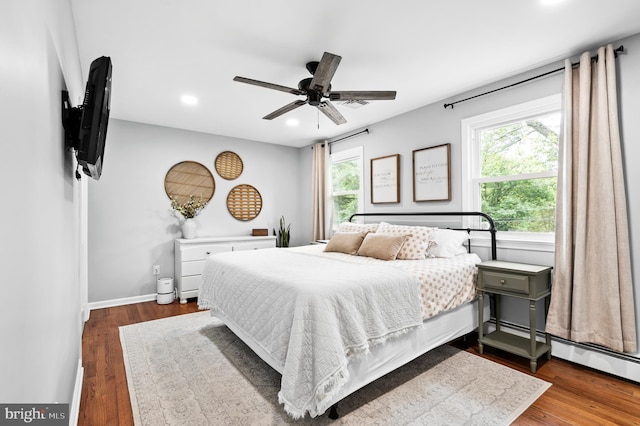 126 Woodview Dr, Doylestown, PA 18901 - bedroom featuring multiple windows, recessed lighting, dark wood finished floors, and a ceiling fan