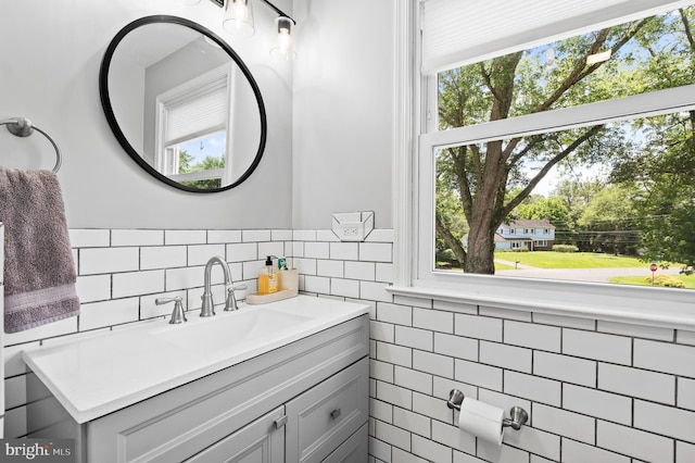 126 Woodview Dr, Doylestown, PA 18901 - bathroom featuring vanity, tile walls, and decorative backsplash