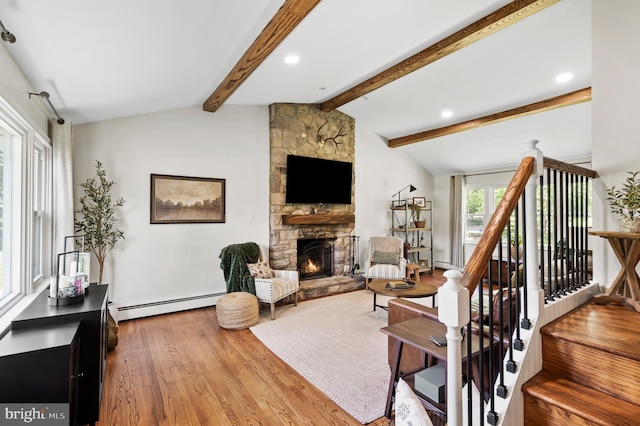 126 Woodview Dr, Doylestown, PA 18901 - living room featuring a baseboard heating unit, wood finished floors, a fireplace, and recessed lighting