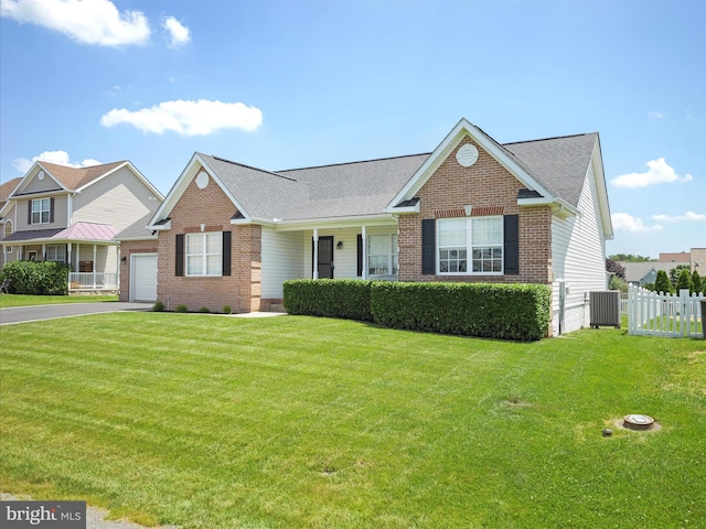 101 Carrera Ct, Inwood, WV 25428 - view of front of property featuring brick siding, driveway, an attached garage, and a shingled roof