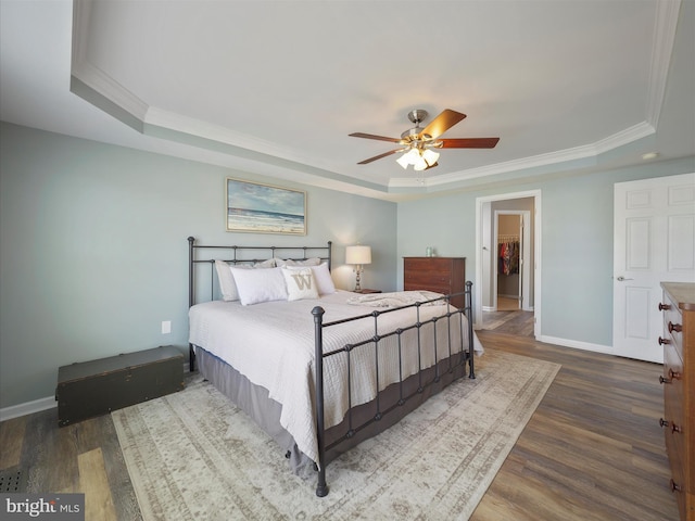 101 Carrera Ct, Inwood, WV 25428 - bedroom with a raised ceiling, crown molding, wood finished floors, and ceiling fan