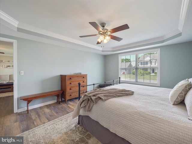 101 Carrera Ct, Inwood, WV 25428 - bedroom featuring a tray ceiling, crown molding, wood finished floors, and ceiling fan