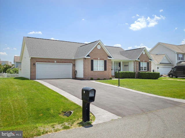 101 Carrera Ct, Inwood, WV 25428 - view of front of property featuring brick siding, driveway, a garage, and roof with shingles