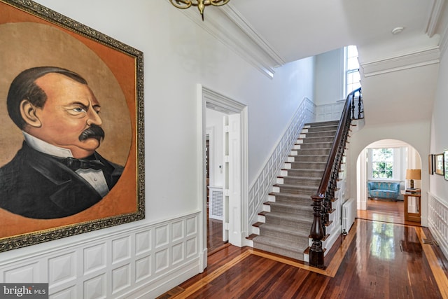 15 Hodge Rd, Princeton, NJ 08540 - stairway with wood-type flooring, arched walkways, and crown molding