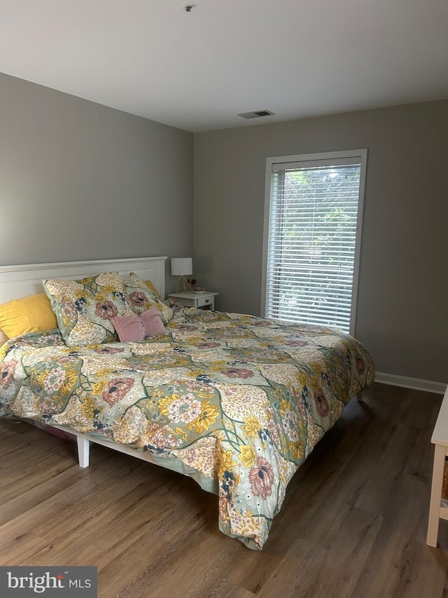 3176 Summit Square Dr Unit 4-D7, Oakton, VA 22124 - bedroom with wood finished floors and baseboards