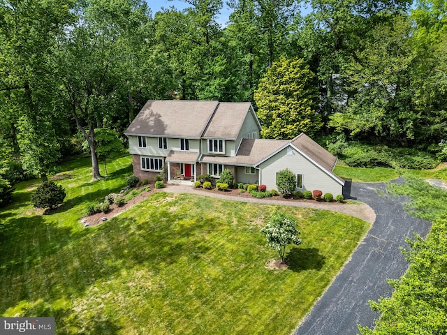 211 Fox Ln, Wallingford, PA 19086 - view of front of home featuring a front yard and asphalt driveway