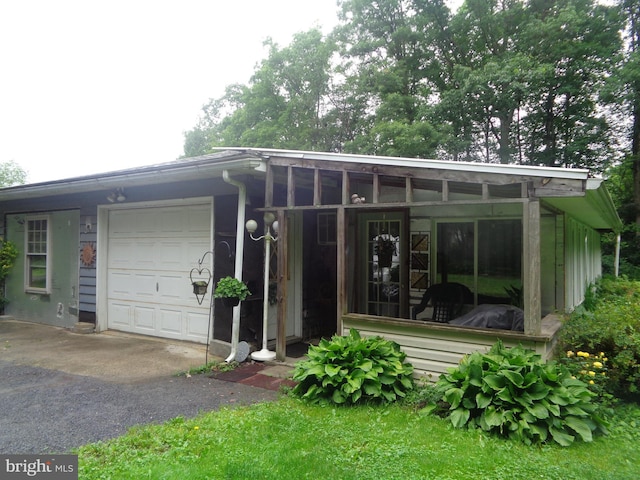 4350 Back Maitland Rd, Mcclure, PA 17841 - view of front facade featuring a garage and asphalt driveway
