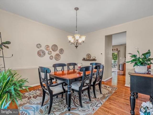 158 Dinwiddie Way, Kearneysville, WV 25430 - dining area featuring crown molding, wood finished floors, and a chandelier