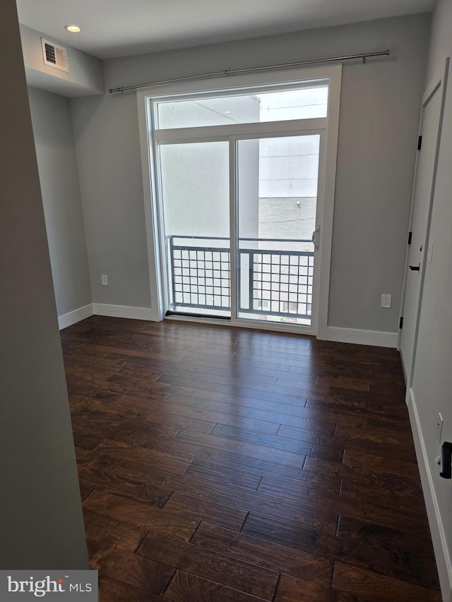 1101 Fern St NW Unit 301, Washington, DC 20012 - empty room featuring wood finished floors and recessed lighting