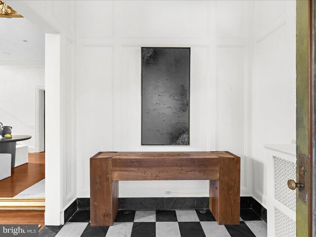 4332 N Charles St, Baltimore, MD 21218 - detailed view of a decorative wall, tile patterned floors, and ornamental molding