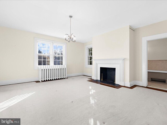 4332 N Charles St, Baltimore, MD 21218 - unfurnished living room featuring a chandelier, carpet flooring, and a fireplace with flush hearth