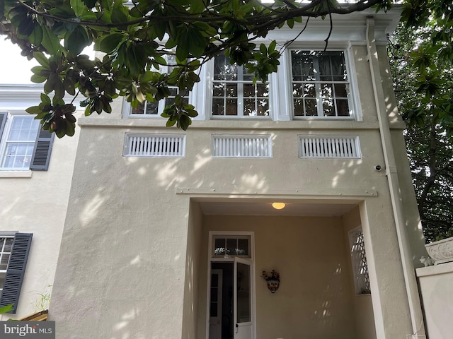 4332 N Charles St, Baltimore, MD 21218 - exterior view of stucco siding