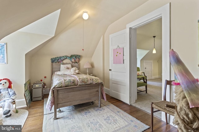 4332 N Charles St, Baltimore, MD 21218 - bedroom with vaulted ceiling and wood finished floors