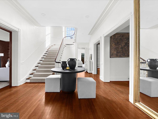 4332 N Charles St, Baltimore, MD 21218 - foyer entrance with stairway, wood finished floors, and ornamental molding