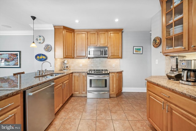 1406 Hamilton St, Wilmington, DE 19806 - kitchen with stainless steel appliances, backsplash, ornamental molding, light stone countertops, and pendant lighting