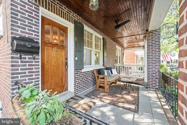 1406 Hamilton St, Wilmington, DE 19806 - entrance to property featuring covered porch, brick siding, and ceiling fan