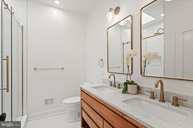 7 U St NW, Washington, DC 20001 - bathroom with a shower stall, double vanity, recessed lighting, and tile patterned floors
