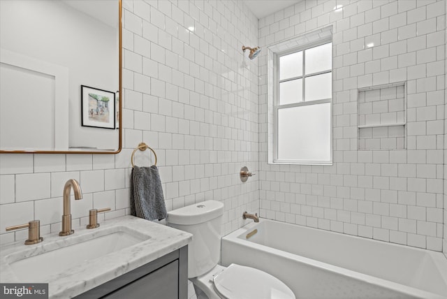 7 U St NW, Washington, DC 20001 - full bath featuring tile walls, vanity, shower / washtub combination, and tasteful backsplash