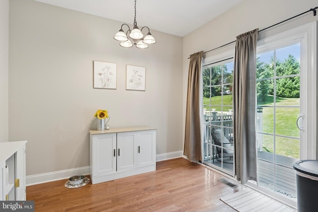 31 Hoag Ln, Aston, PA 19014 - dining space with light wood-style flooring and a chandelier