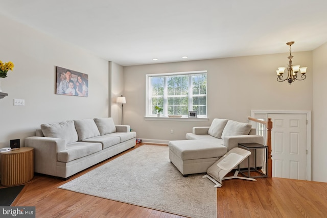 31 Hoag Ln, Aston, PA 19014 - living room with a chandelier, wood finished floors, and recessed lighting