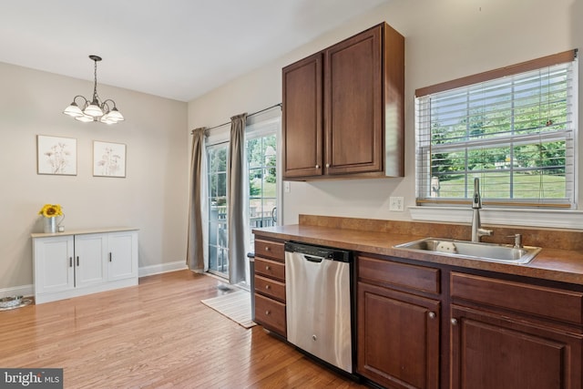 31 Hoag Ln, Aston, PA 19014 - kitchen with dishwasher, light wood-style flooring, decorative light fixtures, a chandelier, and dark countertops