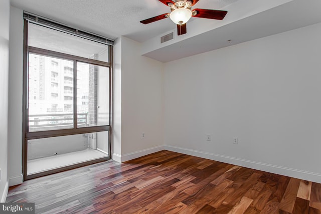 3650 S Glebe Rd Unit 239, Arlington, VA 22202 - empty room featuring wood finished floors and a ceiling fan
